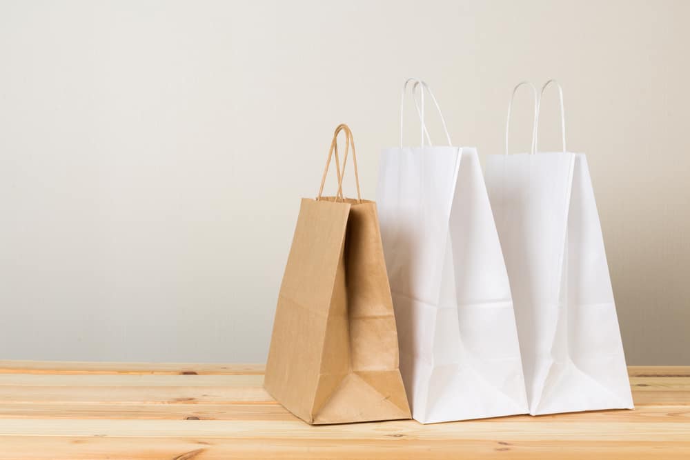 An,Empty,Paper,Bag,With,Handles,For,Shopping,,On,The